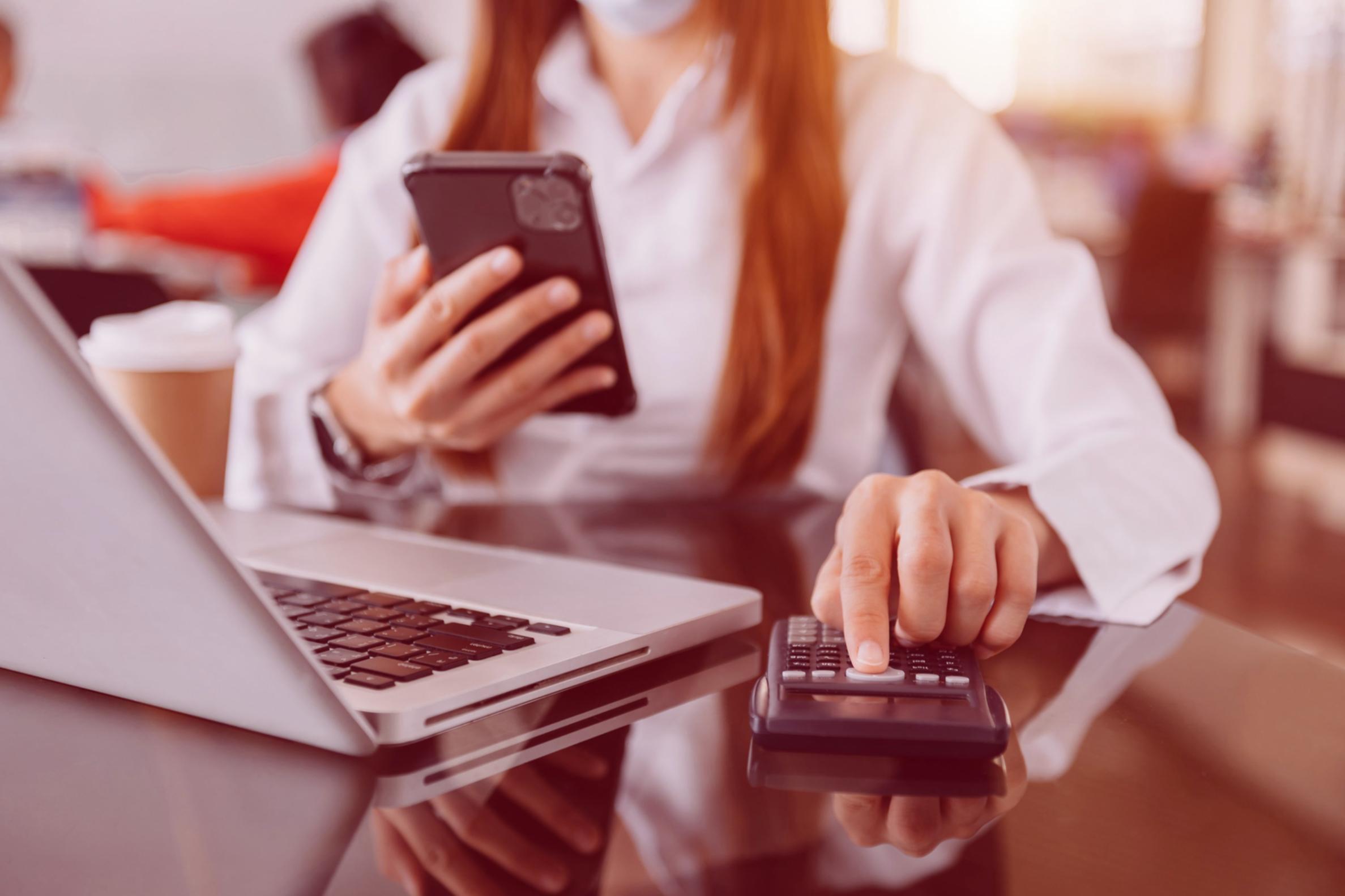 Professional workspace showing financial communication planning